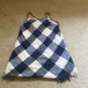 This is a blue and white checkered dress. And it’s very casual.